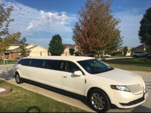 White Limousine service in a shiny day