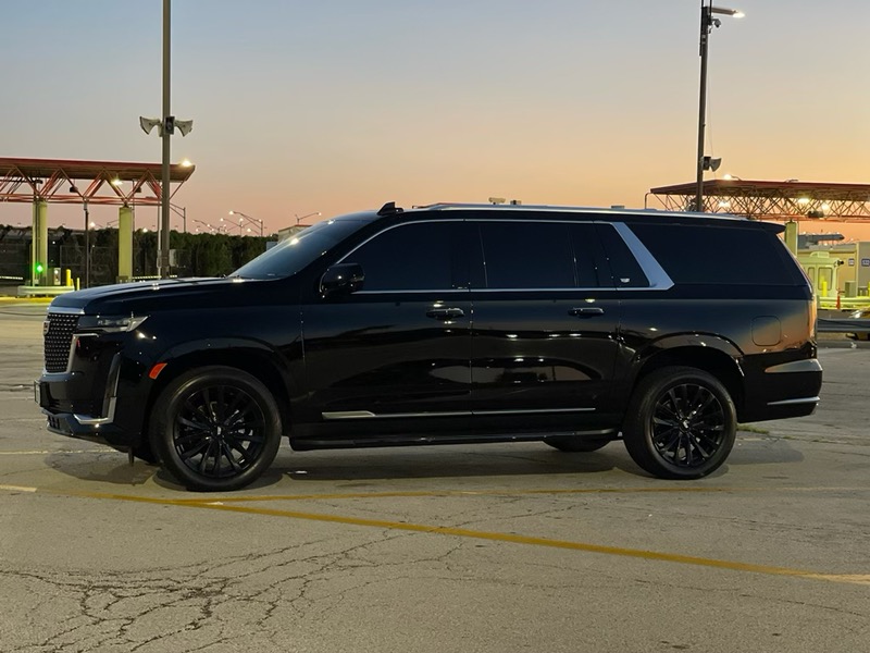 A Black Luxury SUV standing in the Parking