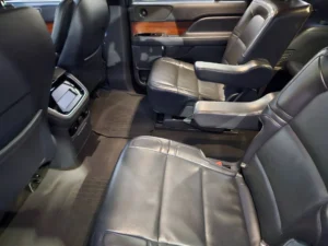 Interior of luxury full size suv with captain seating